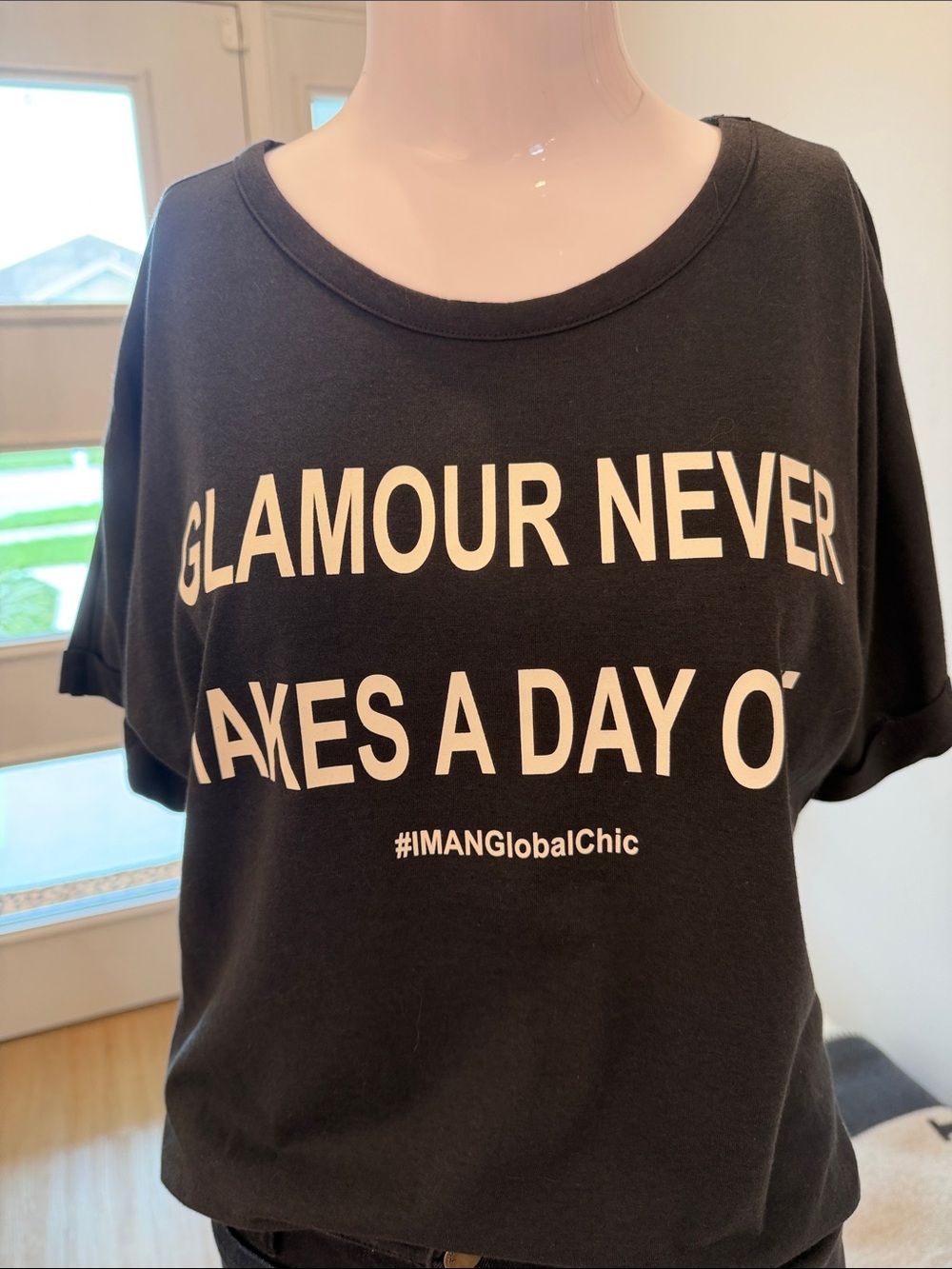 IMAN Black Short-Sleeve Graphic Tee with White Slogan